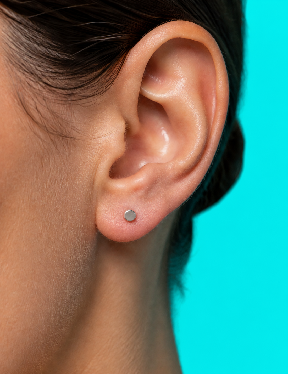 Lobe piercing with titanium jewellery at Day Dweller Studios Bristol