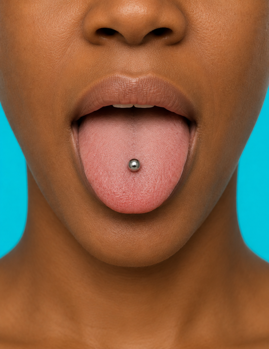 Tongue piercing with titanium jewellery at Day Dweller Studios Bristol