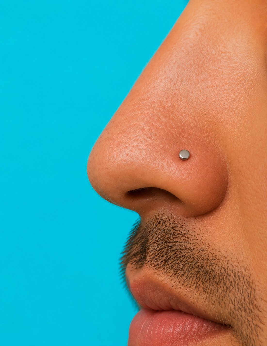 Nostril piercing with titanium jewellery at Day Dweller Studios Bristol
