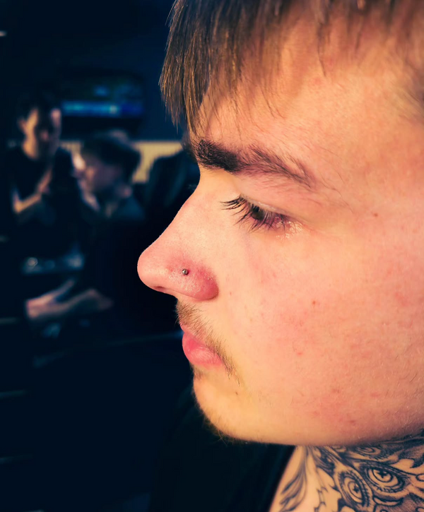Nose piercing performed by Jay at Day Dweller Studios
