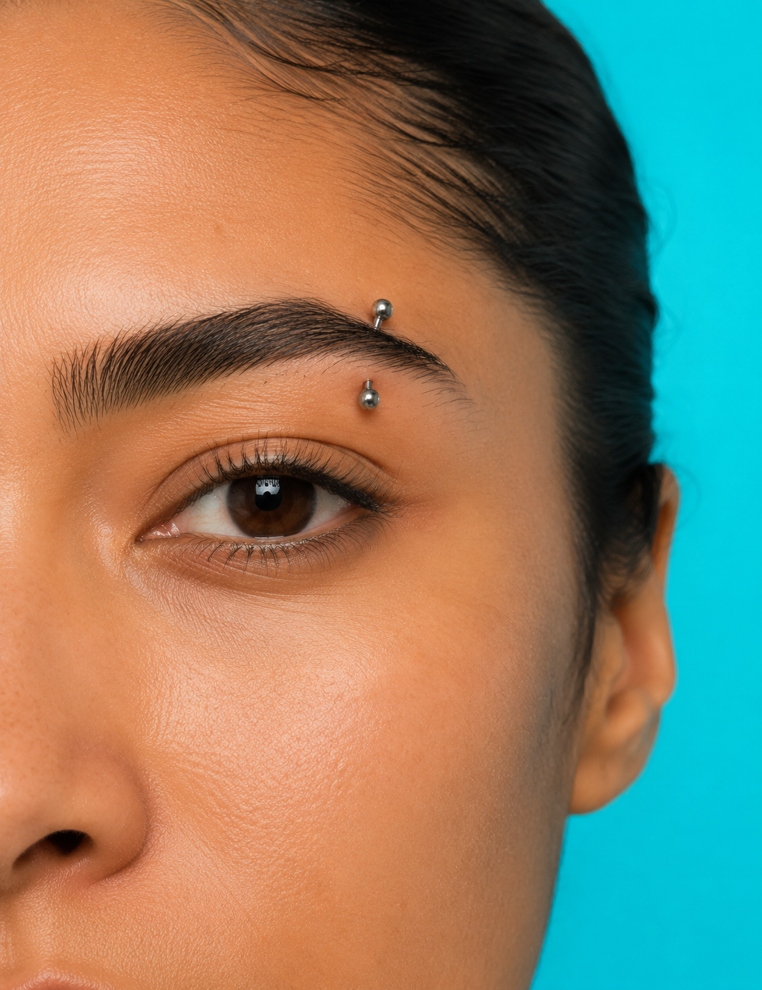 Eyebrow piercing with titanium jewellery at Day Dweller Studios Bristol