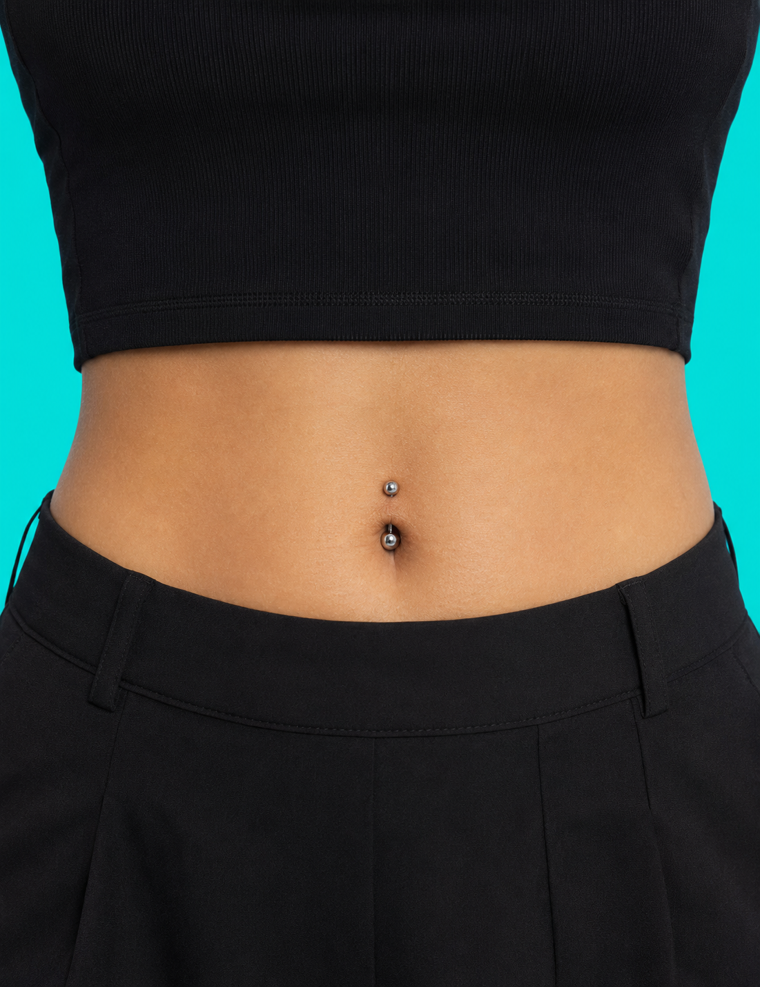 Navel piercing with a titanium curved barbell
